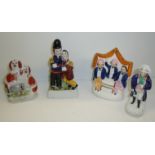 Four small Staffordshire style figures