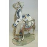Lladro pottery seller and donkey figure