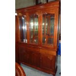 Quality modern Black Diamond display cabinet with three upper glazed doors above three drawers and