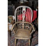 Elm stick back Windsor arm chair with H shaped under stretcher and turned supports