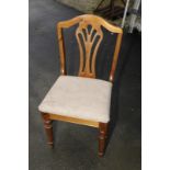 Set of four pine dining chairs with upholstered seats