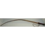 Late 19th C bulls pizzle whip with braided leather grip