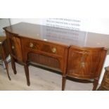 Mahogany Regency style break front serving table with central drawer above frieze drawer flanked by