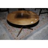 Lightwood oval occasional table on tripod feet