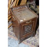 Late Victorian mahogany coal box with carved fall front