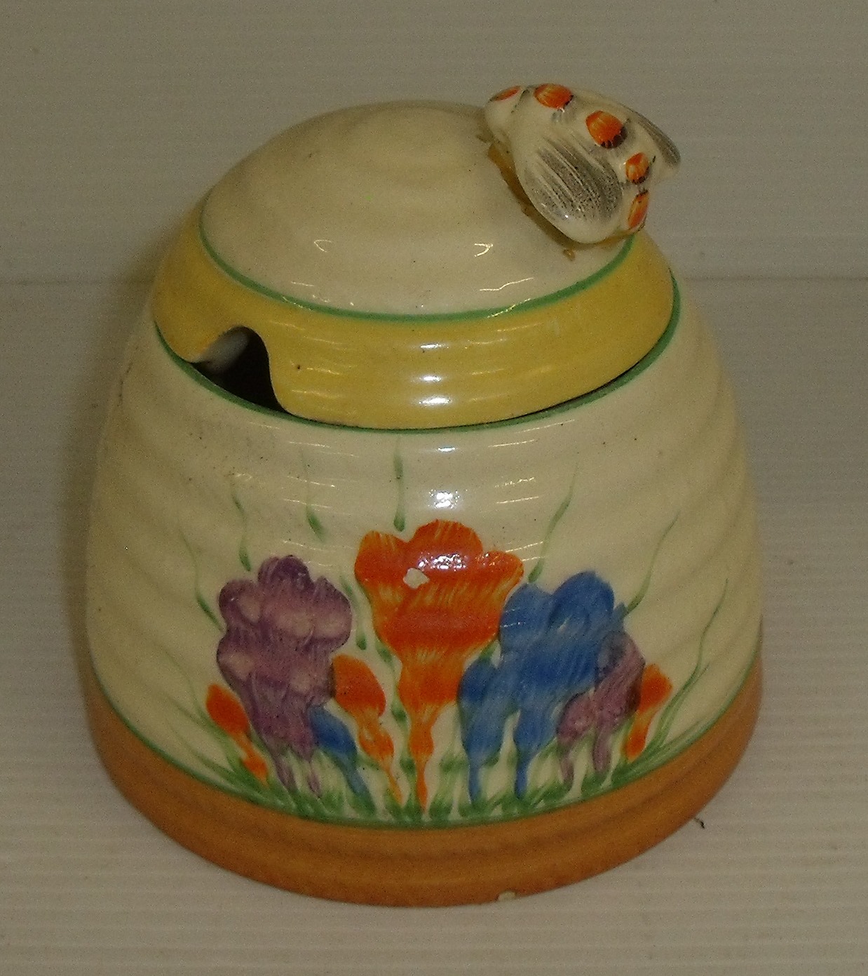 Clarice Cliff crocus pattern preserve pot with printed back stamp