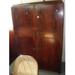 Mahogany double door wardrobe with fitted interior