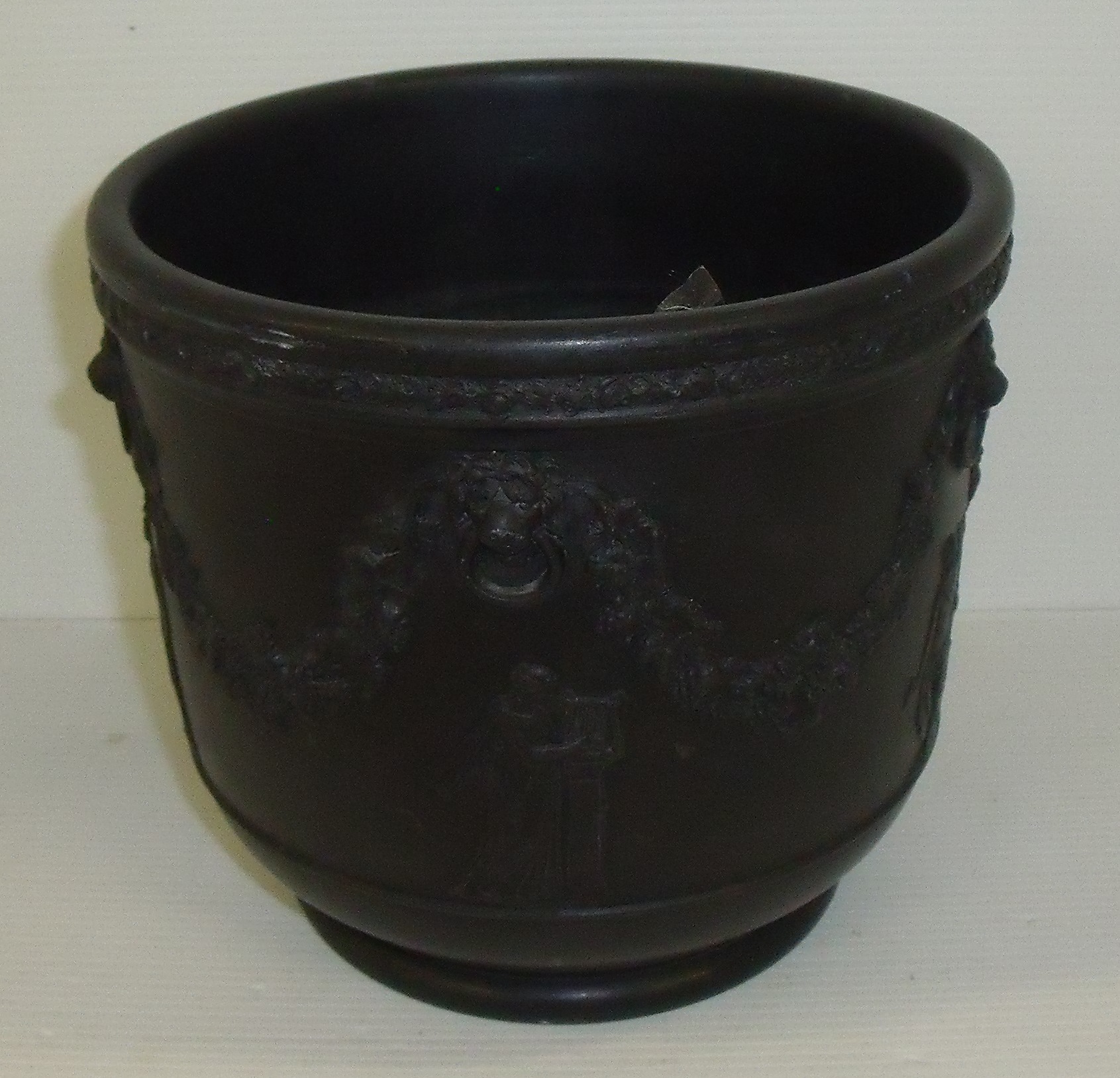 Wedgwood black basalt jardiniere with classical decoration