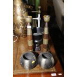 Pair of unusual wooden candlesticks with metal mounts and two coconut style vases and a metal urn