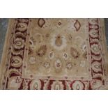 Rectangular woolen beige ground rug