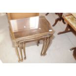 Nest of three mahogany occasional tables