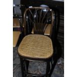 Bentwood bar stool with cane work seats and a Hescot Bentwood retailers label