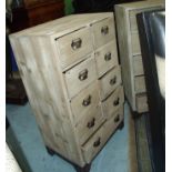 Pair of modern lightwood pigeon hole style chests of drawers with eight short above single long