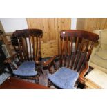 Pair of farmhouse style slat back armchairs with upholstered seats and double H shaped under