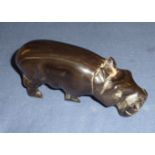 Carved horn figure of a hippo