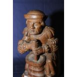 19th C carved oak figure of a 17th C sty