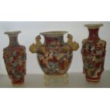 Large Japanese earthenware Satsuma ware vase on three raised dog of foe feet and pair of glazed