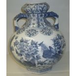 Large blue and white twin handled bottle vase with exotic bird and chrysanthemum pattern and six