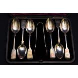 Cased set of six Edinburgh silver hallmarked tea spoons and later added sugar tongs