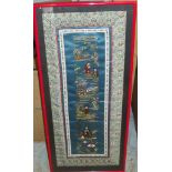 Framed Chinese embroidered panel depicting various figures, pagodas etc.