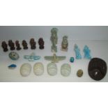 Selection of carved Egyptian figures including scarab beetles, goddesses etc.