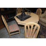 Modern beech octagonal dining table and set of four chairs with upholstered seats