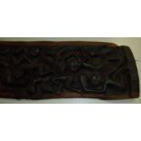 African carved rectangular panel depicting various figures