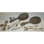 Silver backed hairbrush and mirror with embossed decoration, silver handled knife and fork,