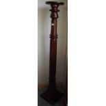 Mahogany jardiniere stand on fluted column and square stepped base