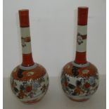 Pair of 19th C Chinese Kutani vases of globe and shaft form with stylized flowers and birds on a