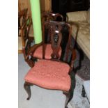 Mahogany armchair with upholstered seat and carved detail