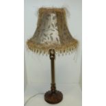 Modern bronze effect table lamp with decorative shaped and beaded shade