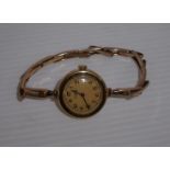 Cased J. W. Benson ladies 9ct gold wrist watch with expanding bracelet strap