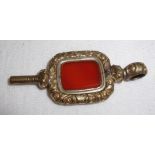 Victorian gilt metal watch key fob set with rectangular hard stone