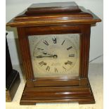 Early 20th century mahogany Ansonia bracket clock. Silvered dial with engraved Roman numerals. Two