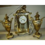 Art Deco French variegated marble and ormolu clock garniture in the Egyptian taste. Four glass brass