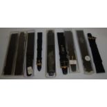 Nine old shop stock as new Omega leather wrist straps with gilt metal buckles