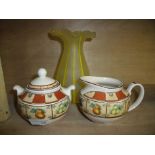 Yellow glass vase and Staffordshire milk jug and sugar bowl