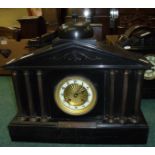 19th C slate mantel clock in architectur