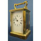 Brass cased carriage clock with bevelled