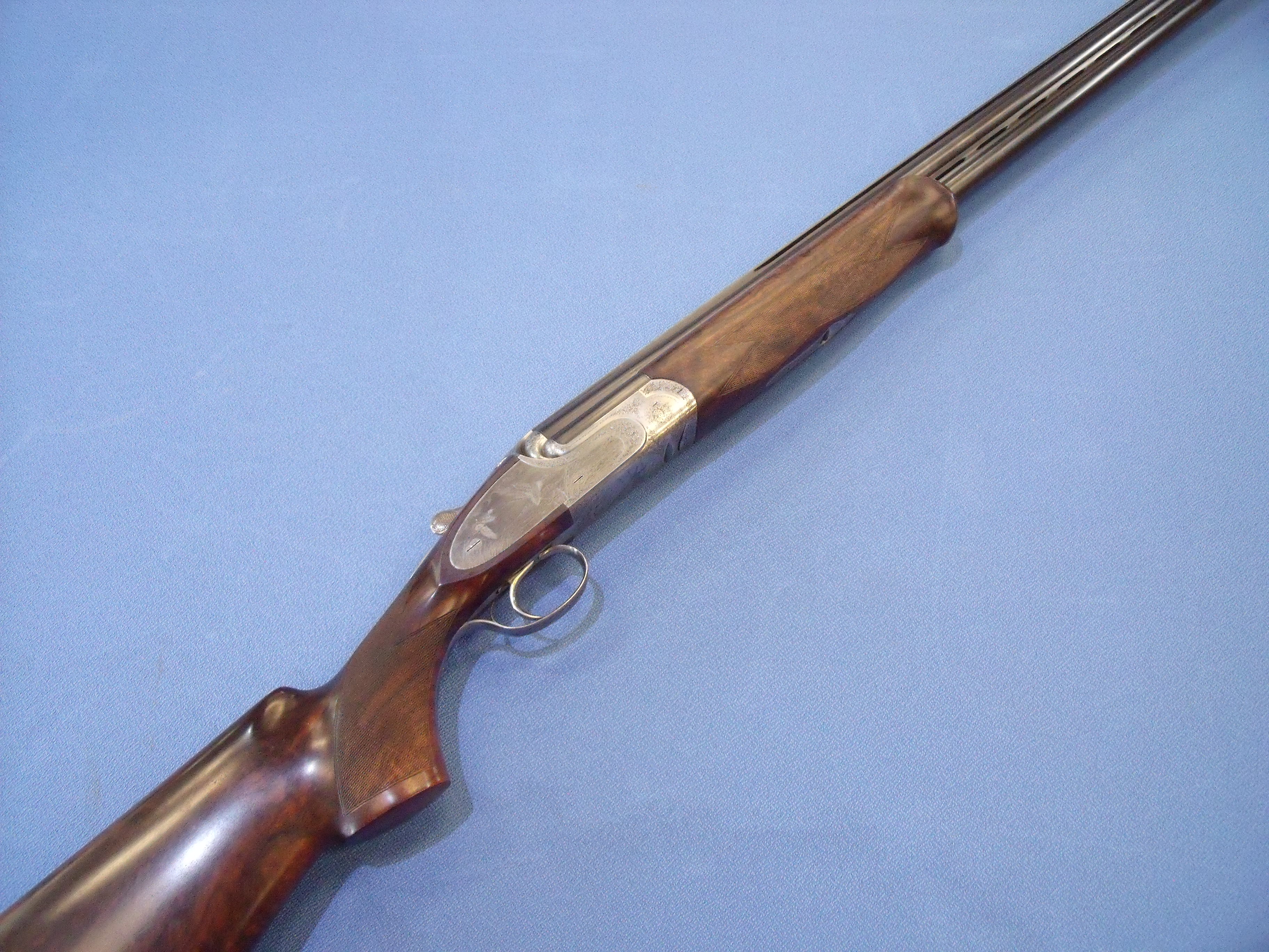 12 bore over & under Famars ML side lock ejector shotgun with pin less locks with elaborately