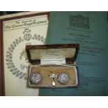 Cased pair of Masonic buttons, The Journ