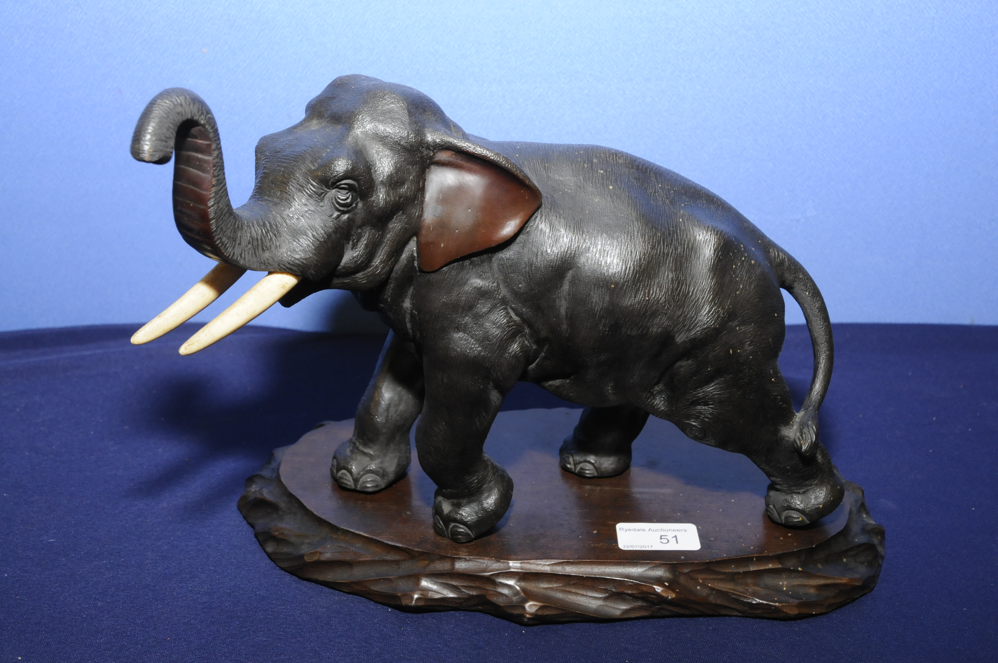 Early 20th C Japanese bronze figure of an elephant with three digit signature panel to the