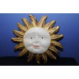 Unusual mid 20th C French papier mache smiling sun face (58cm diameter)