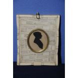 19th C miniature head & shoulders silhouette of a lady in gilt surround mounted in carved bone