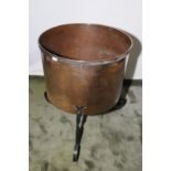Extremely large copper log bin on wrought metal base (diameter 66cm x height 81cm)