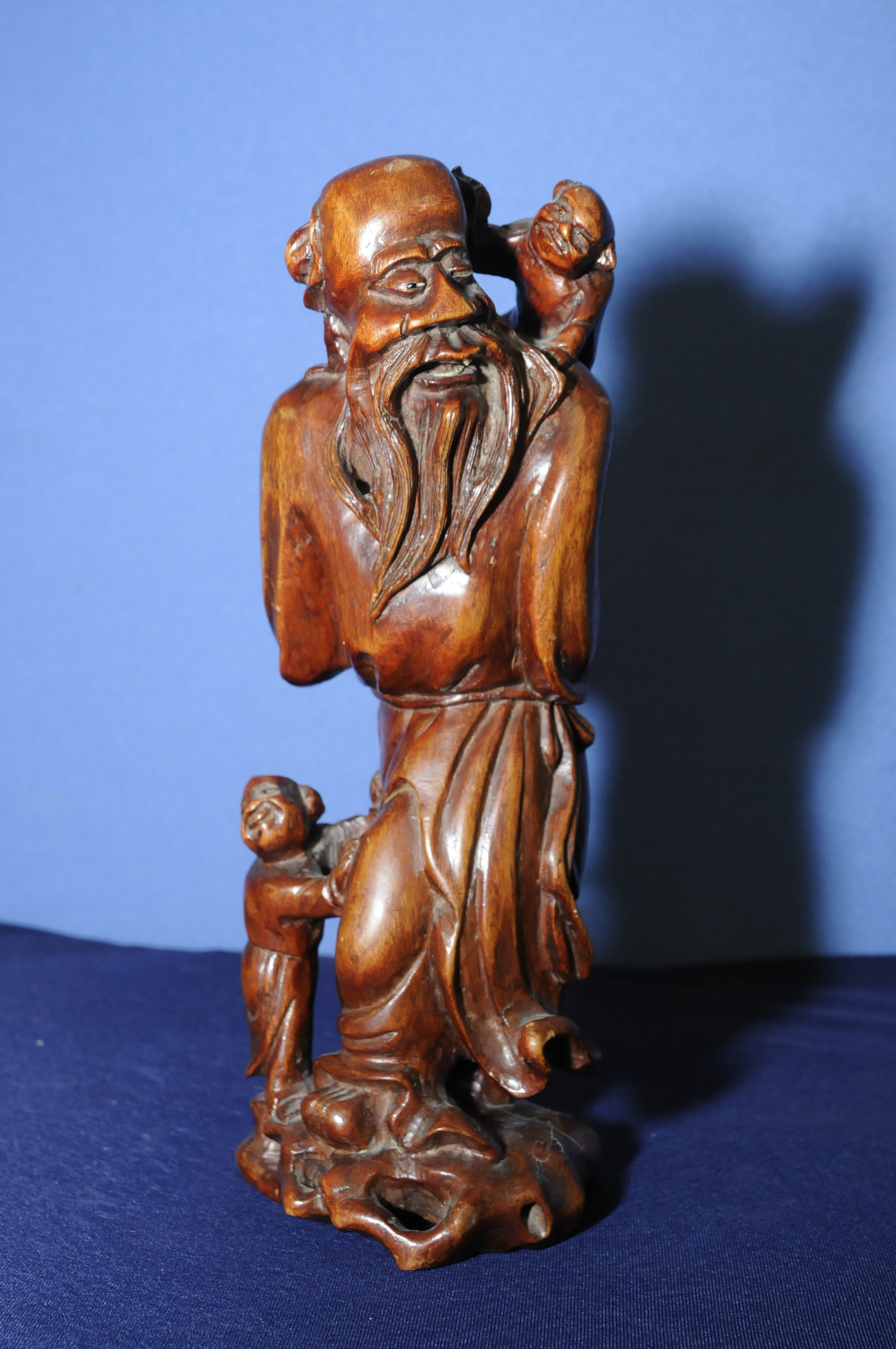 Carved hard wood figure of a sage