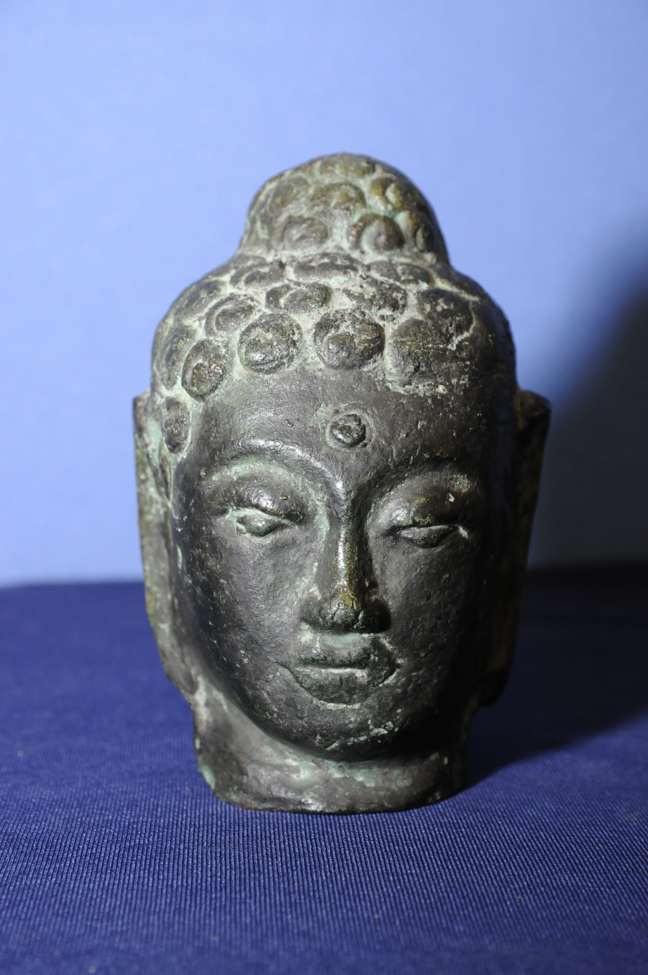 Bronze Buddha head (12cm high)