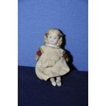 Bisque headed continental doll with jointed legs and arms,