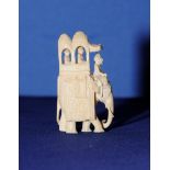 19th C / 20th C Indian carved bone figure of an elephant with figures riding in a howdah (9cm high)